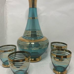 Art Deco pitcher with small glasses